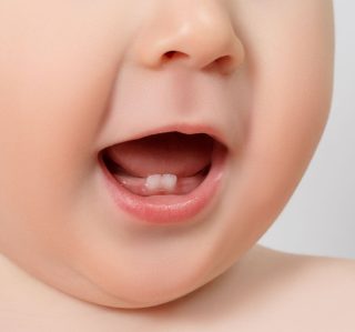 牙齒 5 Fisher Pointe Dental Blog Baby Teeth featured image 530430075 e1791785396779